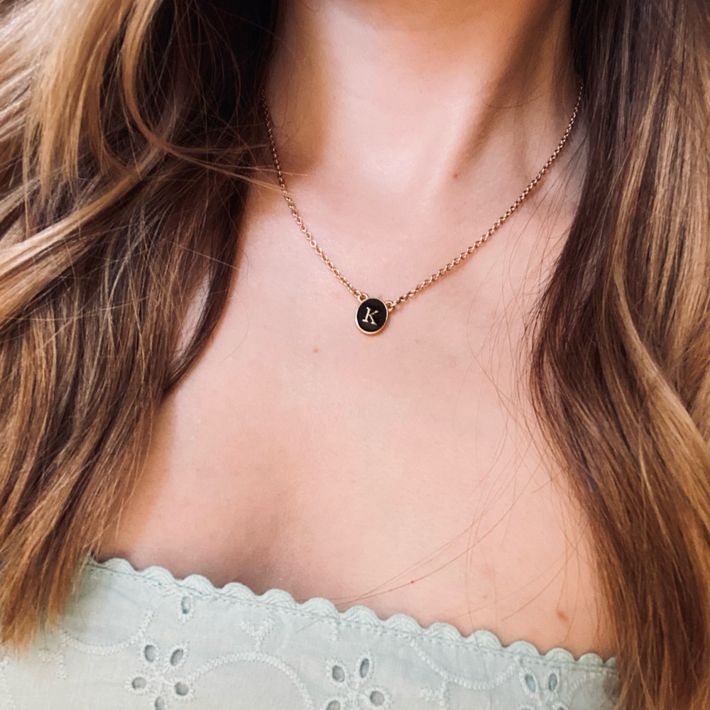 Gold and black “K” initial necklace